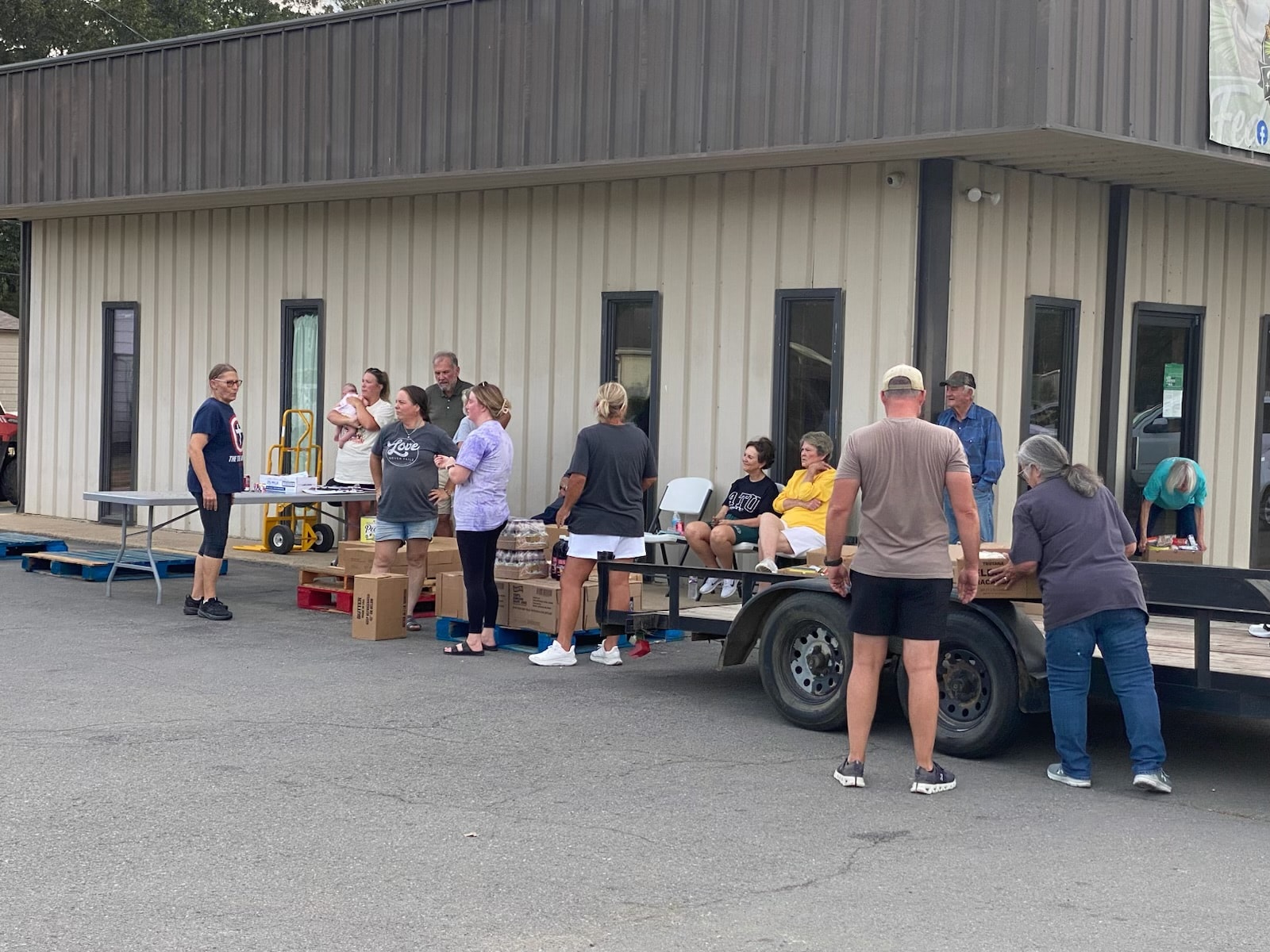 Volunteers distributing food to community members